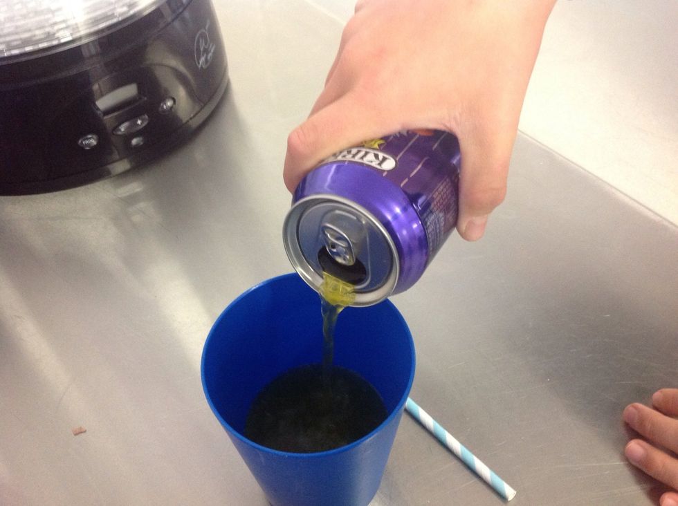 Poor the soft drink into the cup
