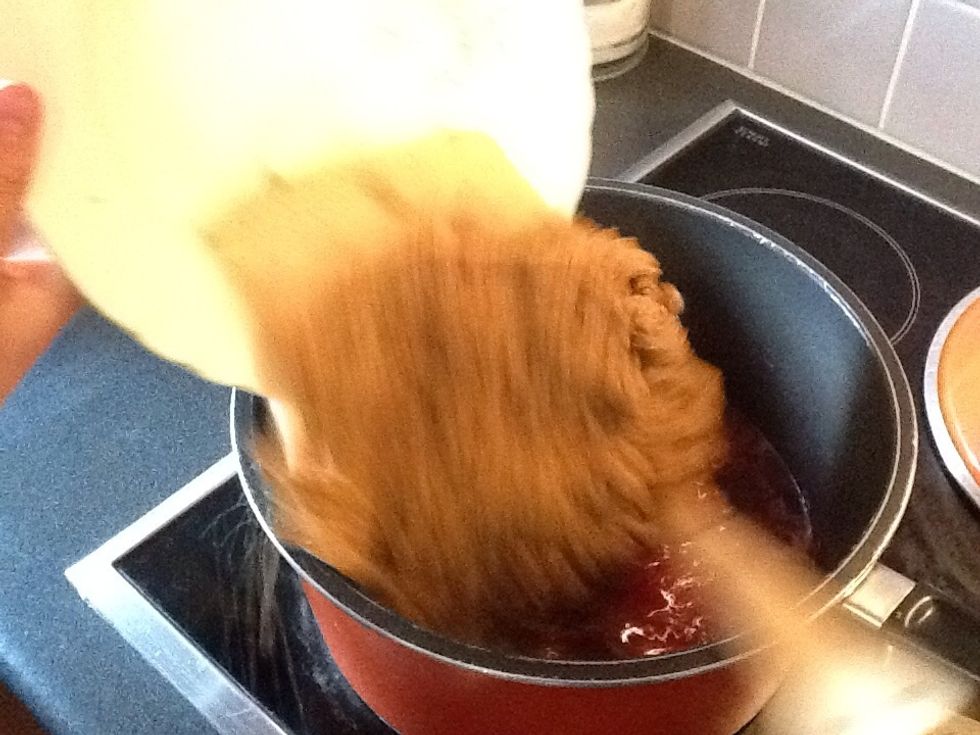 Poor the sugar in gentle then stir