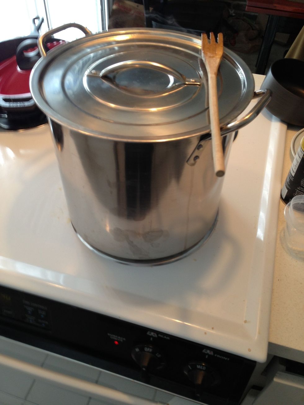 Pop a lid on for 5 min to get the carrots all steamy.