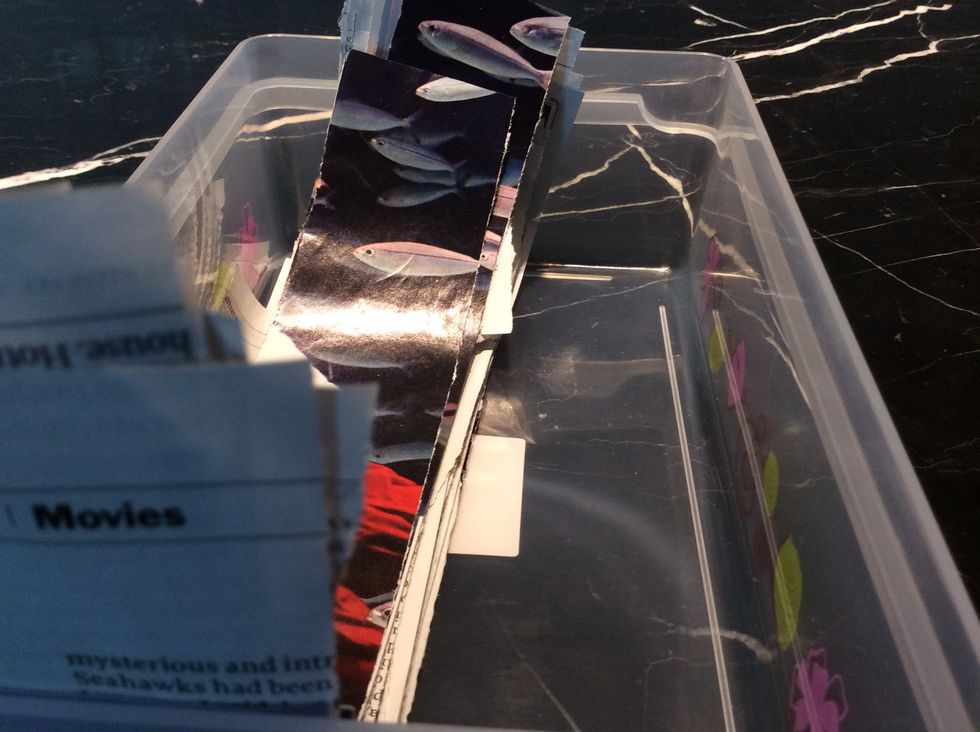 Pop all of your paper strips into a container, this makes it a ton less messier than it could be, and it makes it pretty easy to grab and...well just take a look at the next step.