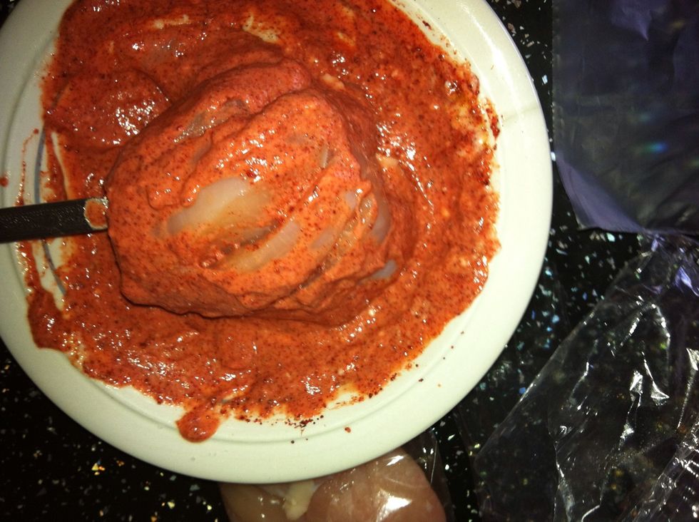 Pop the Chicken in the Tandoori Mix give it a good coating....
