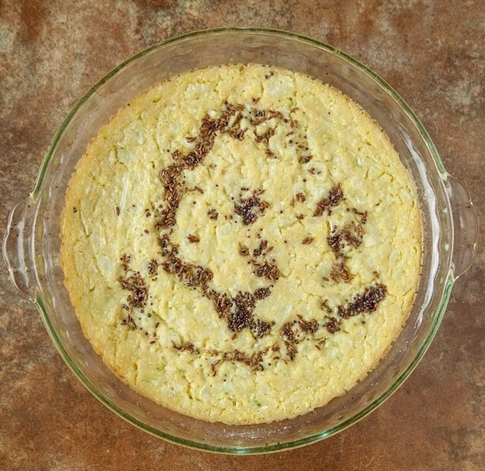 Pop the whole thing into the oven for 25 to 35 minutes or until the cauliflower mixture is set and lightly golden.