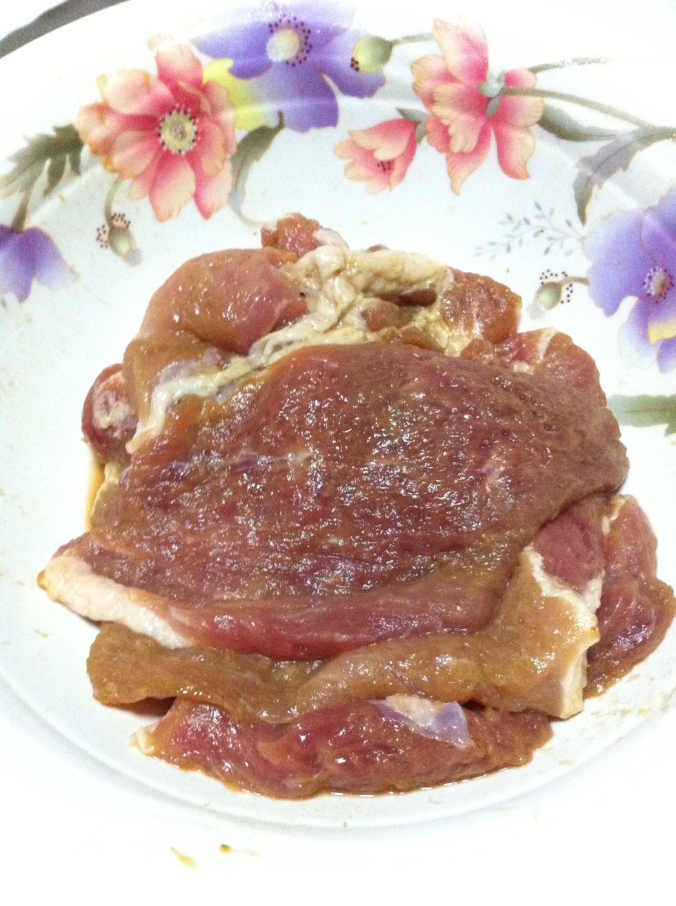 Pork! Marinate with some seasoning..