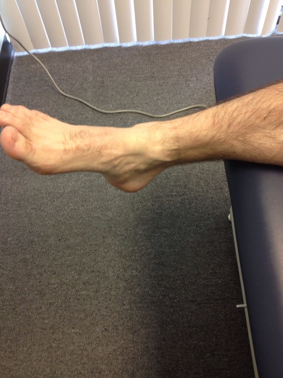 Position the athlete's foot into neutral posture.