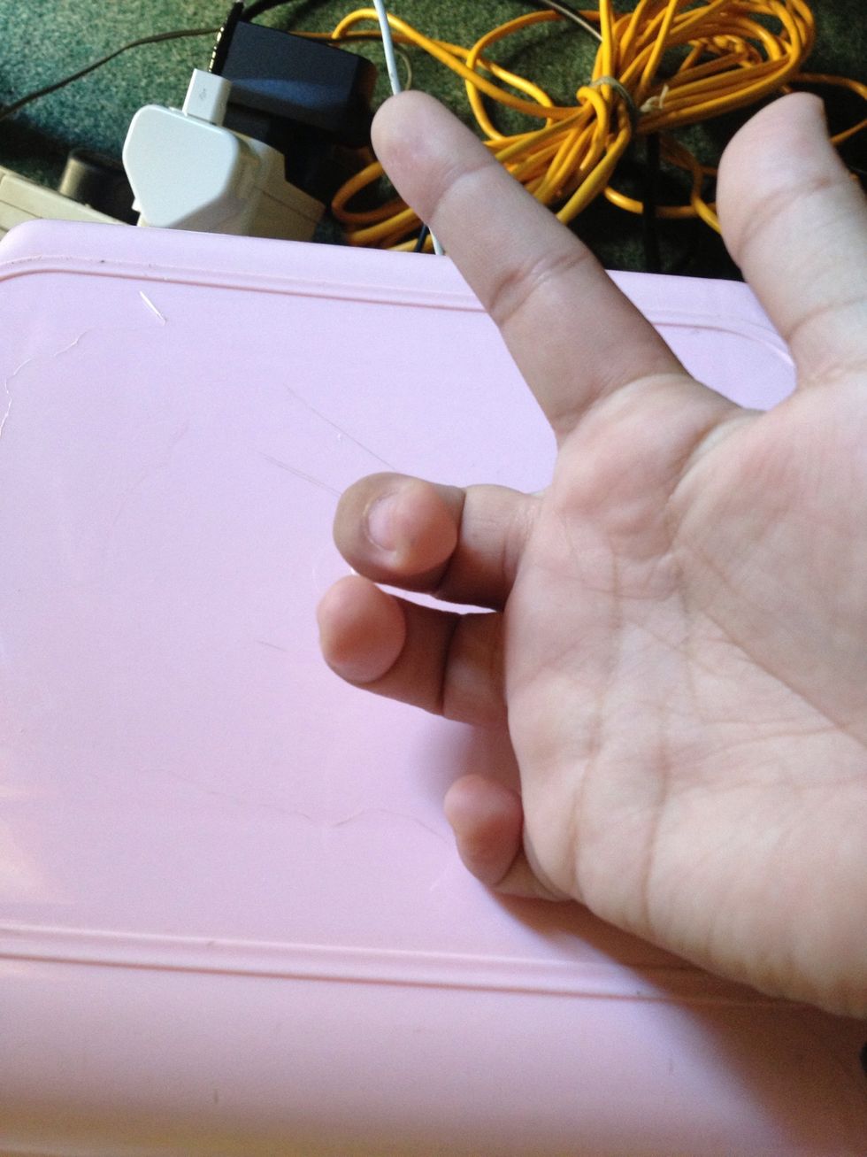 Position your right hand like this. Do everything the same on the left hand.