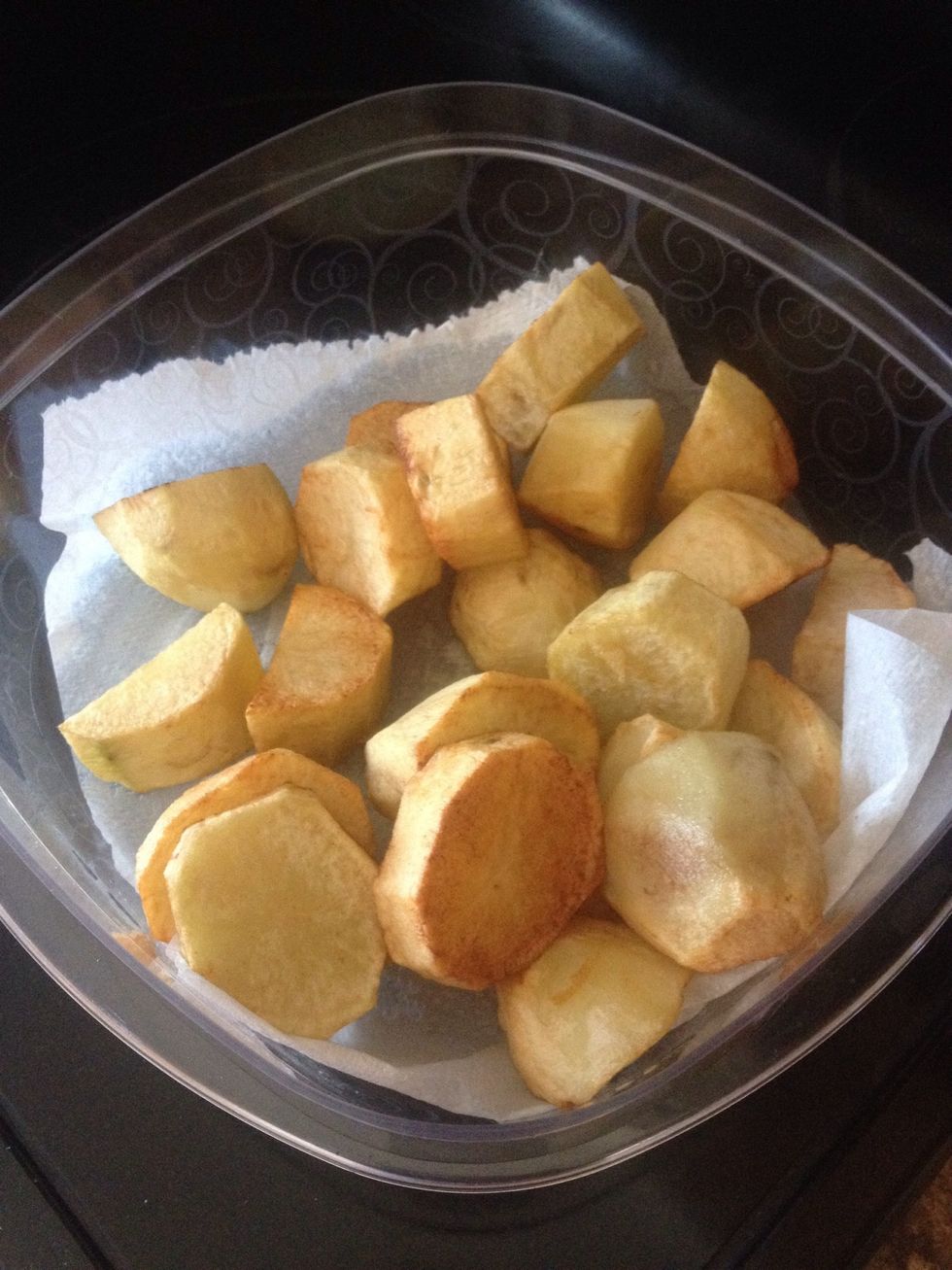 Potatoes are optional. Fry them in oil until golden brown and add to dish at the end.