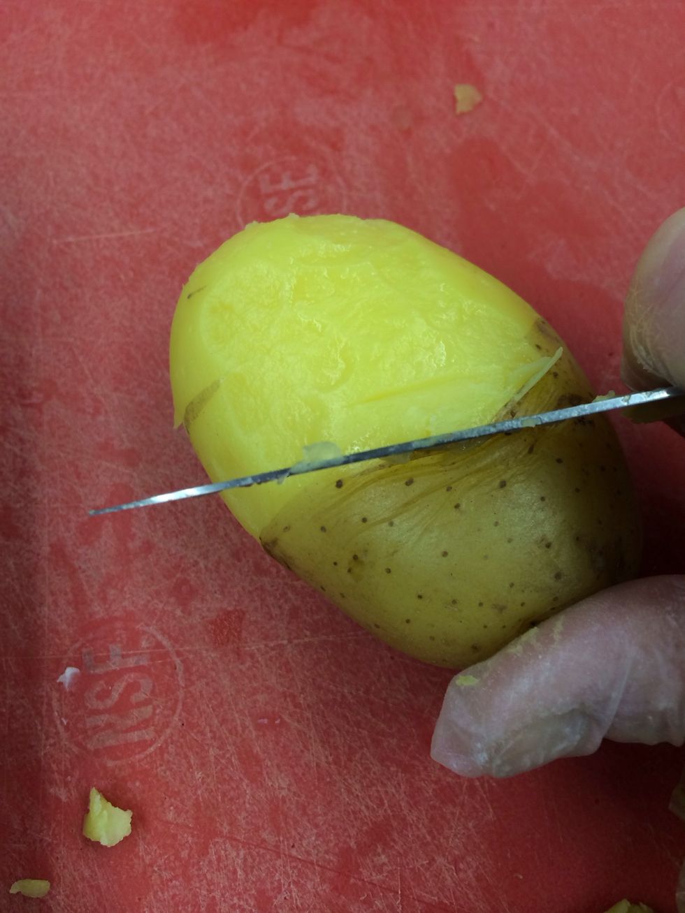 Potatoes are really easy to slip the skins off when cooked.