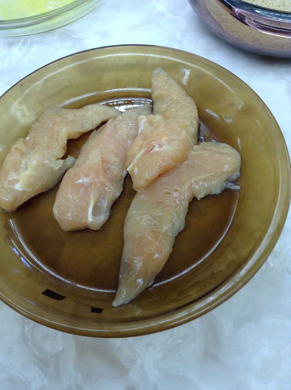 Pound the chicken to a uniform, 1/2 inch thickness. Pat dry with paper towels or clean rag, then season with salt and pepper.