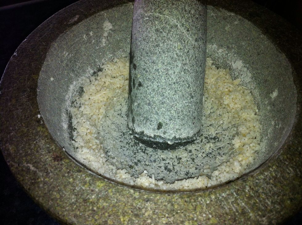 Pound the soaked rice as fine as possible.Some people like it SLIGHTLY grainy. However a good appam needs the batter to be smooth, hence finely ground is better.