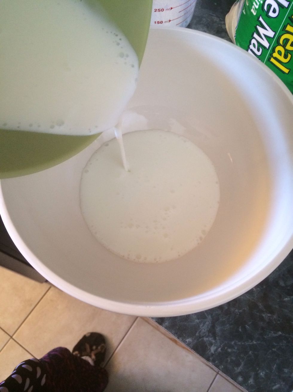 Pour 1 1/4 cups of buttermilk in a large bowl