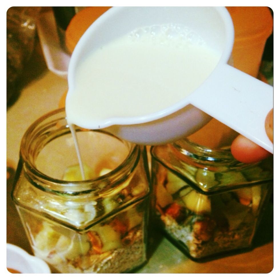 Pour 1/2 cup of milk in the jar (adjust according to your taste) \u2022 if you don't like it thick simply add more milk. \u2022 You can use YOGURT instead of milk (or mix between both)
