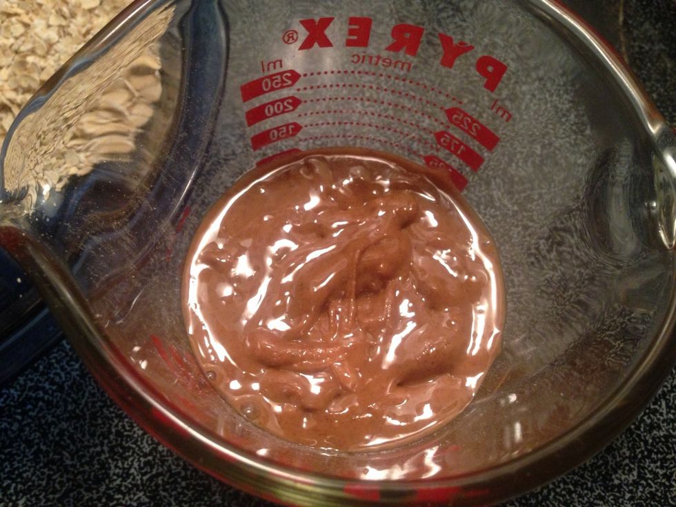 Pour 1/2 cup of raw almond butter into measuring cup. Heat in microwave for 30-45 seconds to melt it