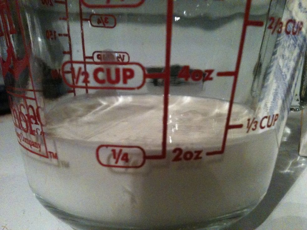 Pour 1/4 a cup of heavy whipping cream in a measuring cup