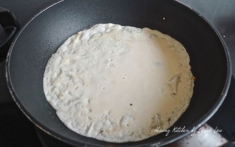 Pour 1/4 cup of batter onto the pan and cook until bubbles form and the edges are dry, about 1 to 2 minutes.