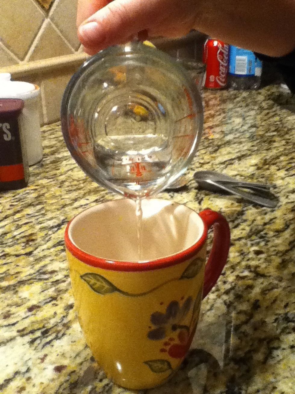 Pour 1/4 cup water into mixture