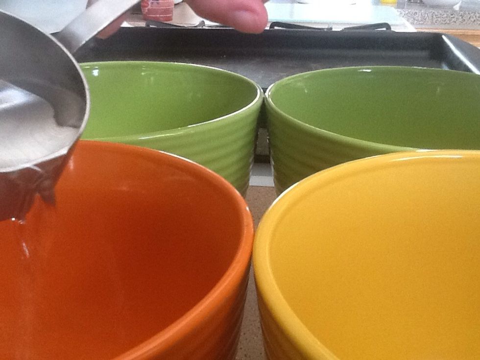 Pour 1/4 cups of water into 5 different bowls