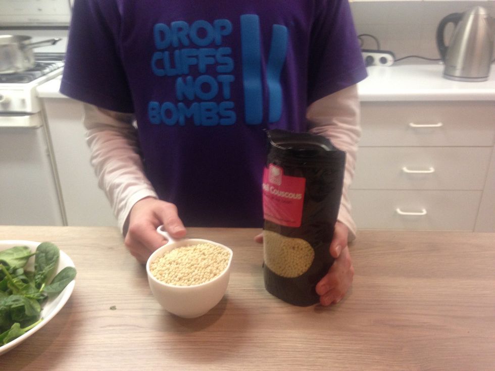 Pour 1 cup of cous cous into pot and at 2 cups of water for the cous cous to soak up