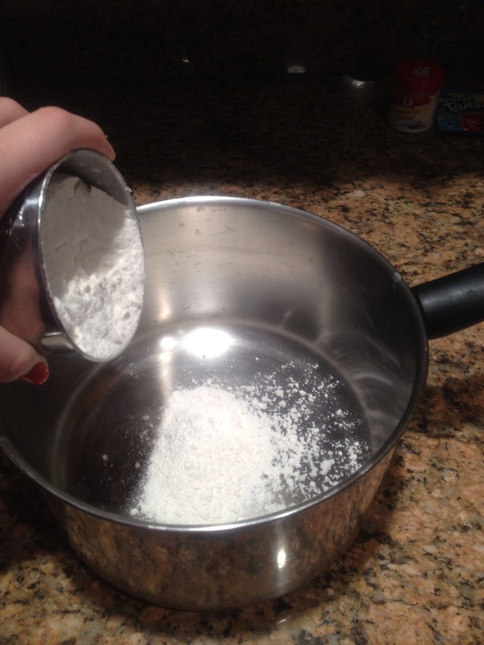Pour 1 cup of flour into saucepan