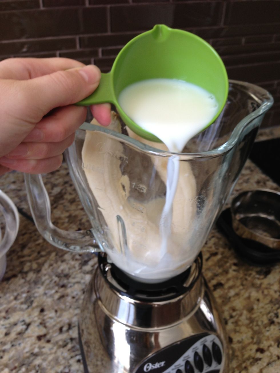 Pour 1 full cup of milk in your blender