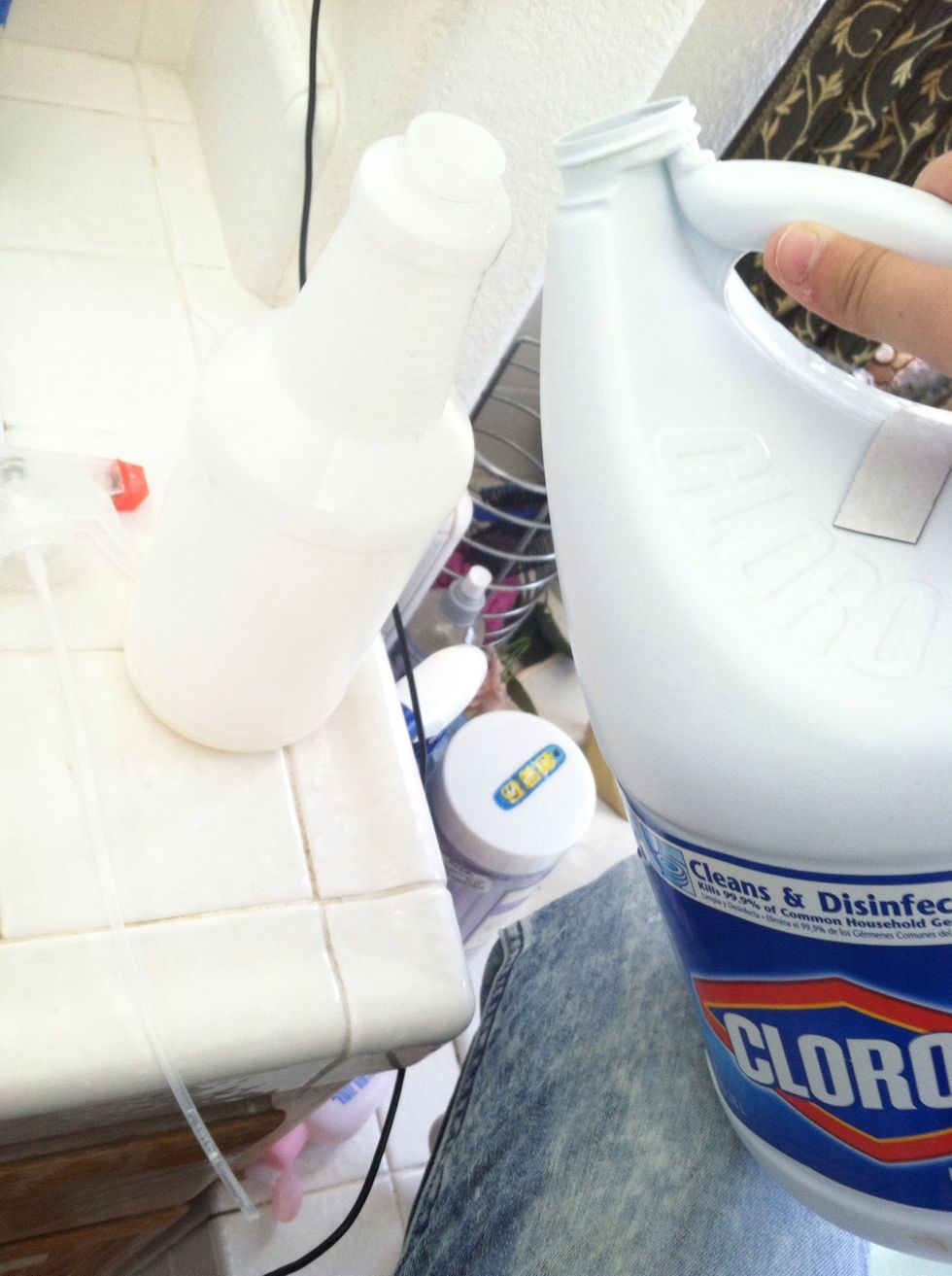 Pour 1 part bleach into spray bottle.