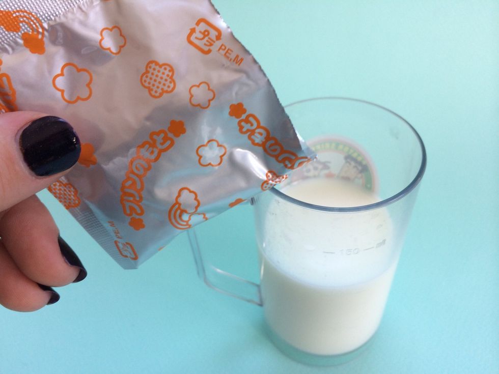 Pour 120 ml of milk Into a cup--Pour full contents of a Pudding Mix into Cup