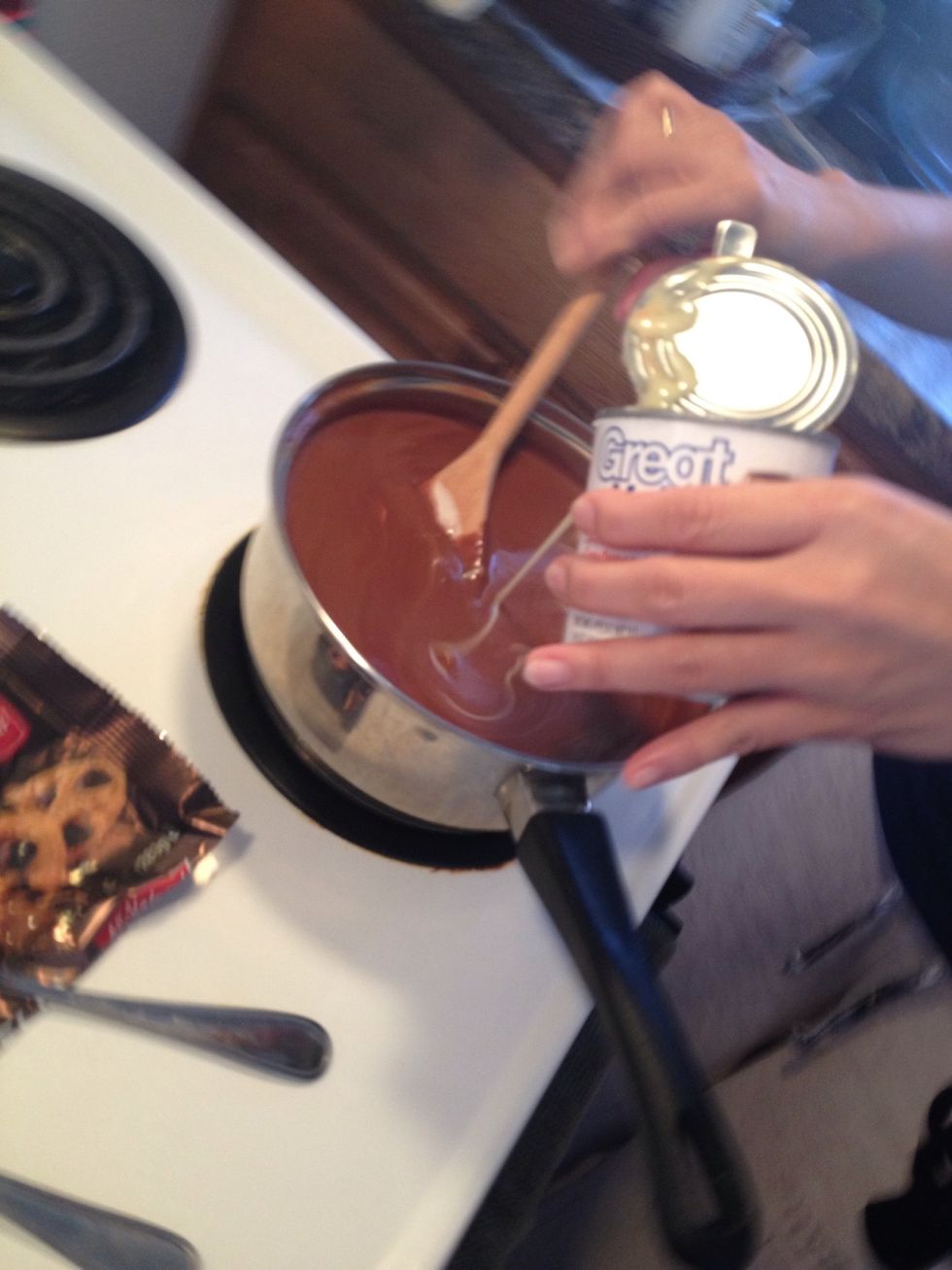 Pour 1can condensed milk.