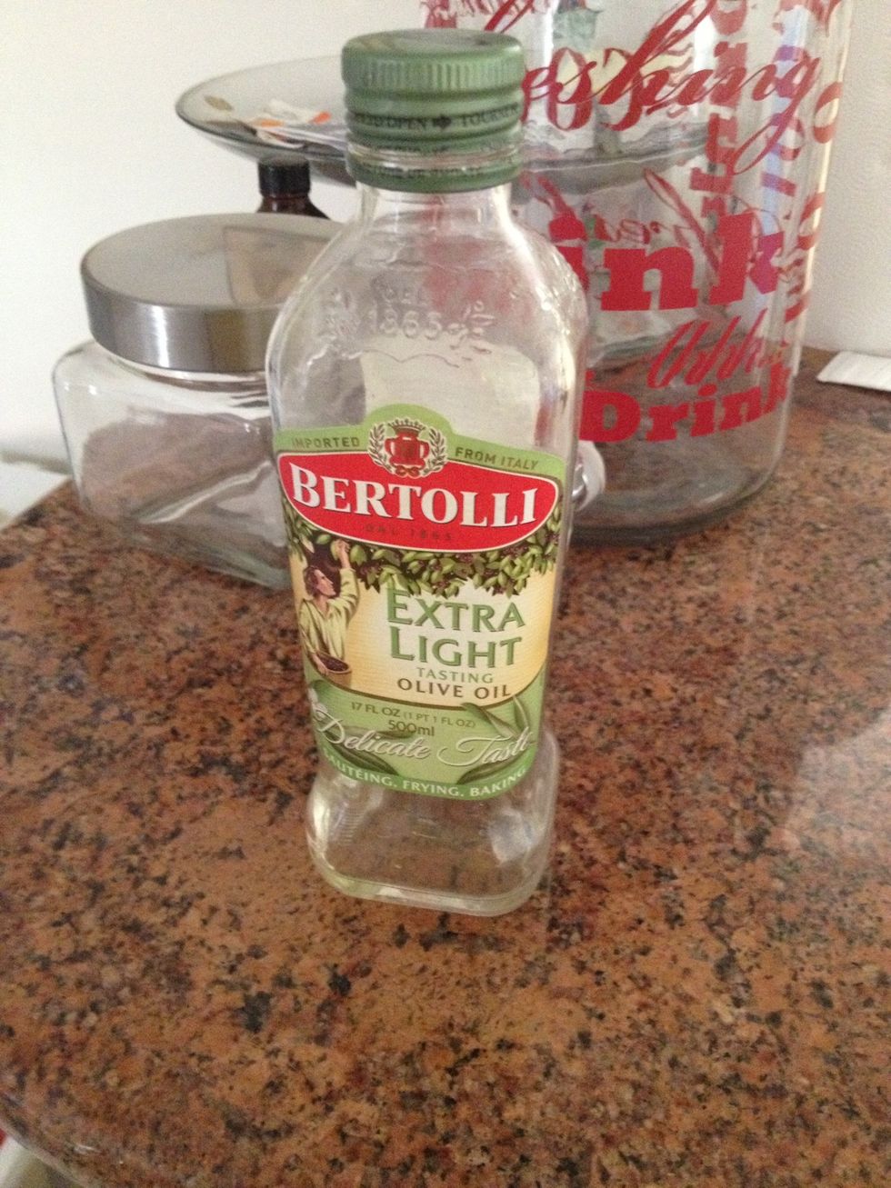 Pour 2/3 tablespoon (any brand) of olive oil into the bowl and mix together