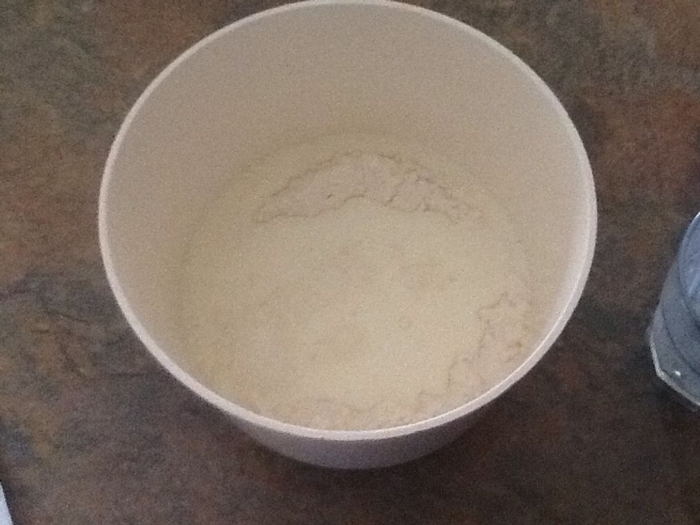 Pour 3/4 of a cup of milk in