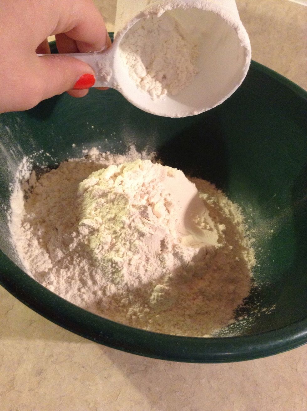 Pour 3 cups of flour into large bowl