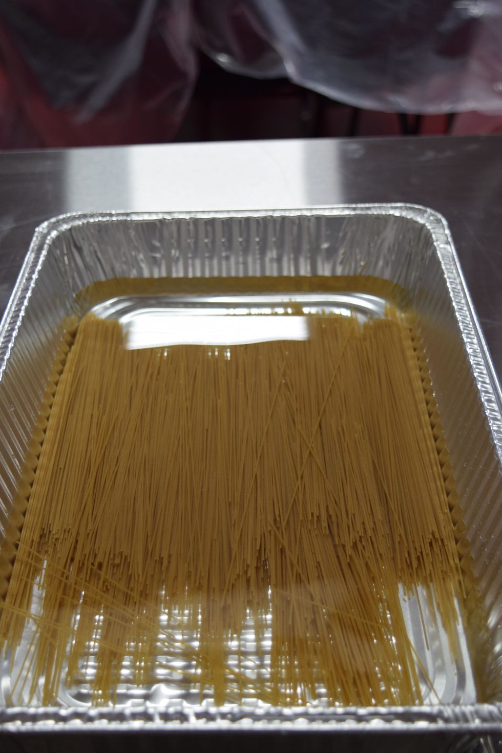 Pour 3 quarts of water over the pasta as soon as the unit is preheated.