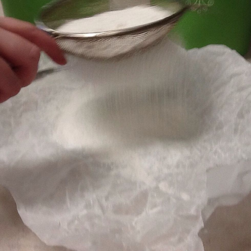 Pour 375 mL sifted flour into medium sized bowl