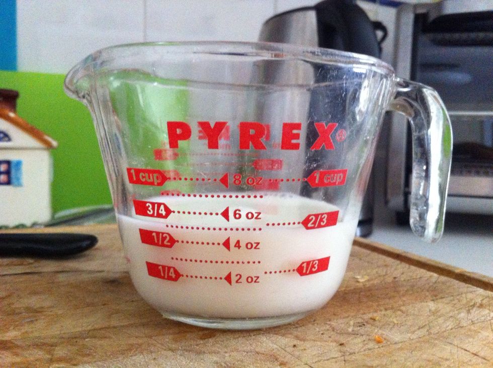 Pour 5oz of milk, also known as 2/3 of a cup! :)