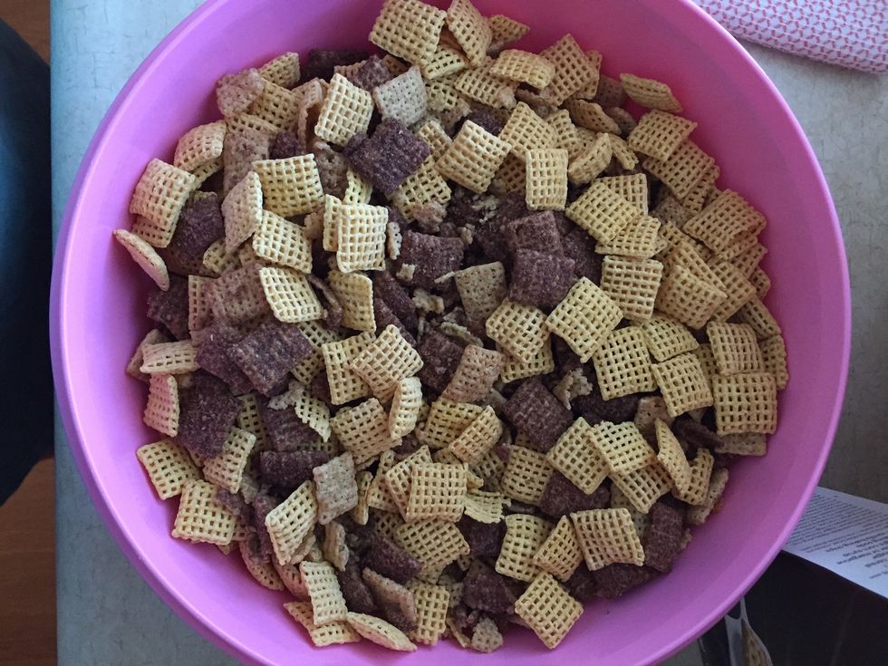 Pour 9 cups of chex cereal into a bowl and set aside