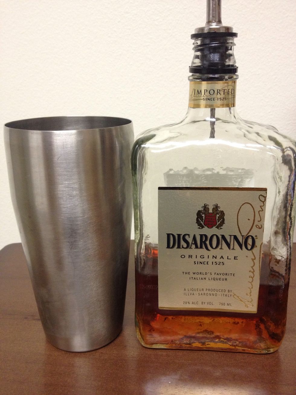 Pour a 1/2 ounce of your favorite Amaretto into the Shaker.