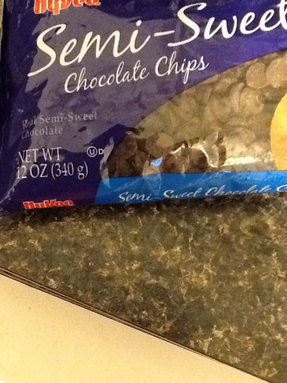 Pour a 12 oz bag of chocolate chips in the pan.