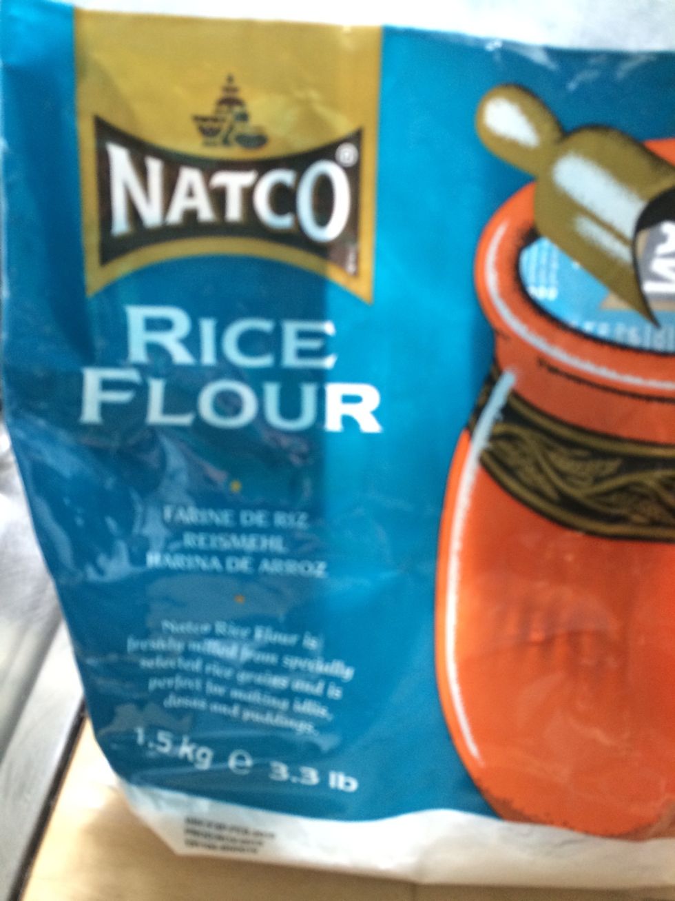 Pour a full cup off rice flour into bowl and fold into egg mixture. Can use normal flour too.