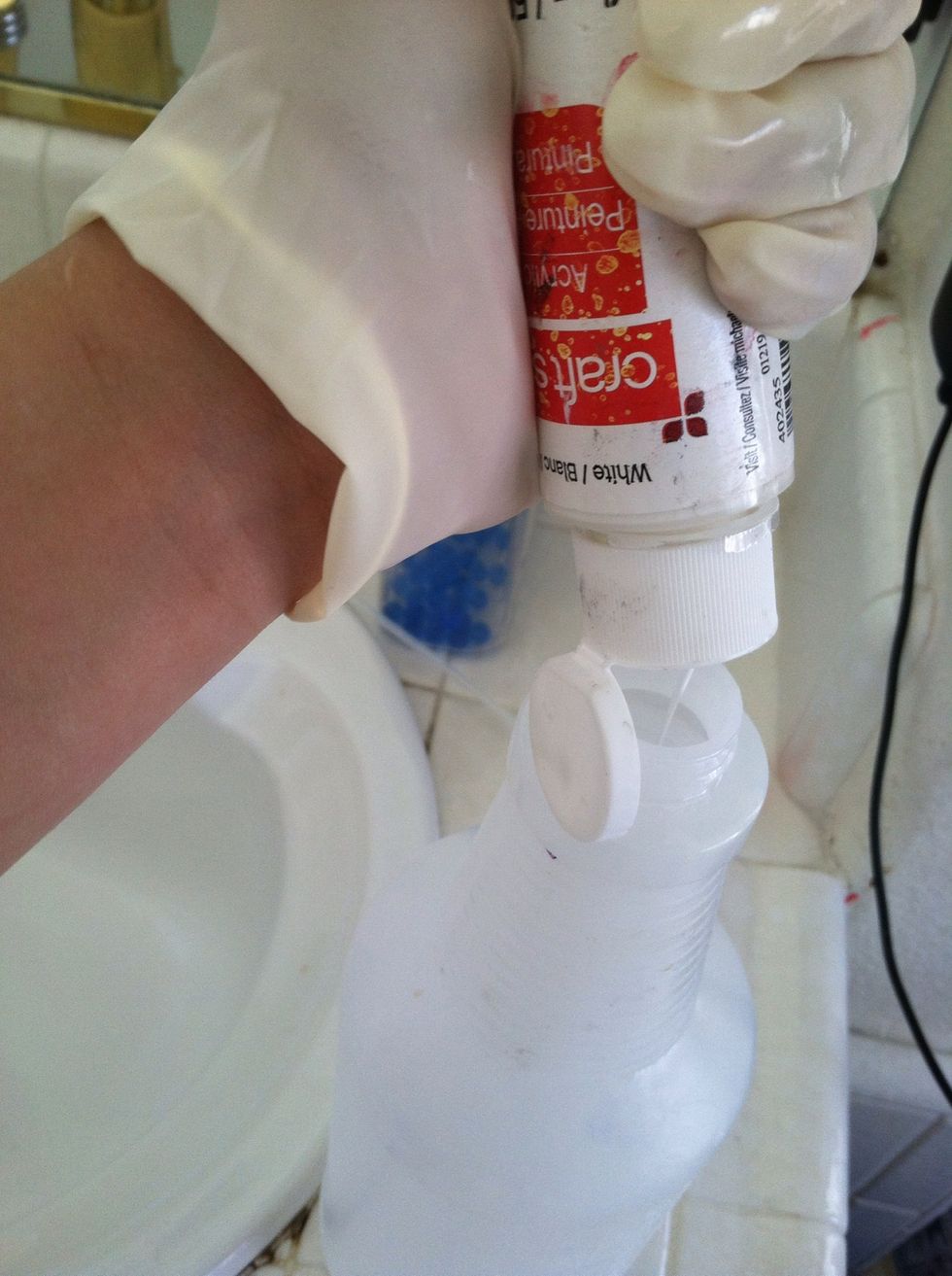 Pour a glob into your emptied spray bottle.