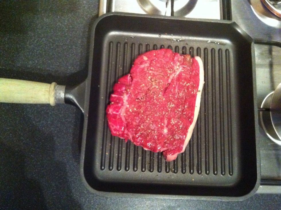 Pour a little oil in griddle pan and smush it around with paper towel. Make sure you get the pan nice and hot before adding steak. Turn over to cook other side  after 5 minutes for medium.