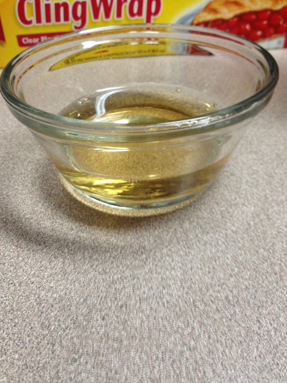 Pour a small amount of apple cider vinegar into small clear glass dish.