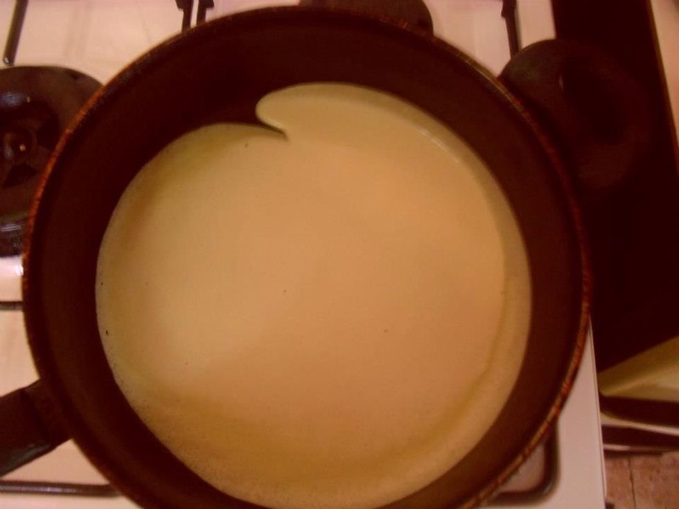 Pour a some amount of the mixture and move it quickly in the fryer