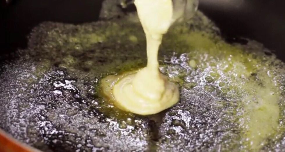 Pour about 3 to 4 tablespoons of batter onto the greased frying pan. The amount you pour will decide the final size of the pancakes, so make sure to pour the right amount. Cook one pancake at a time.