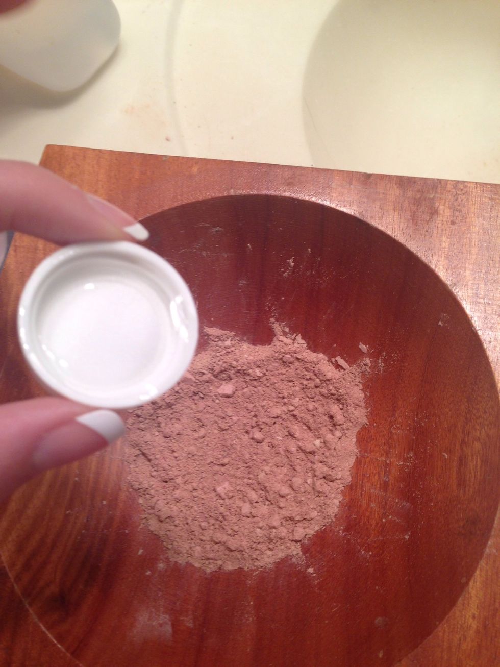 Pour about half a cap of rubbing alcohol into mixture and mix.