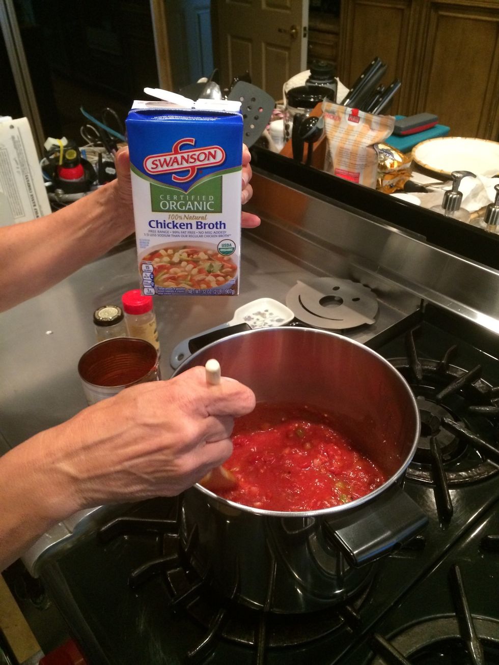 Pour all 32 oz (4 cups) chicken broth in and continue to stir