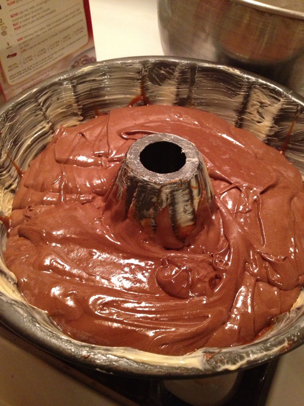 Pour all that good stuff in the pan (: Give it a little shake to even it out