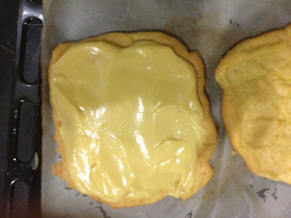 Pour all your custard onto one on the pastry and even it out.