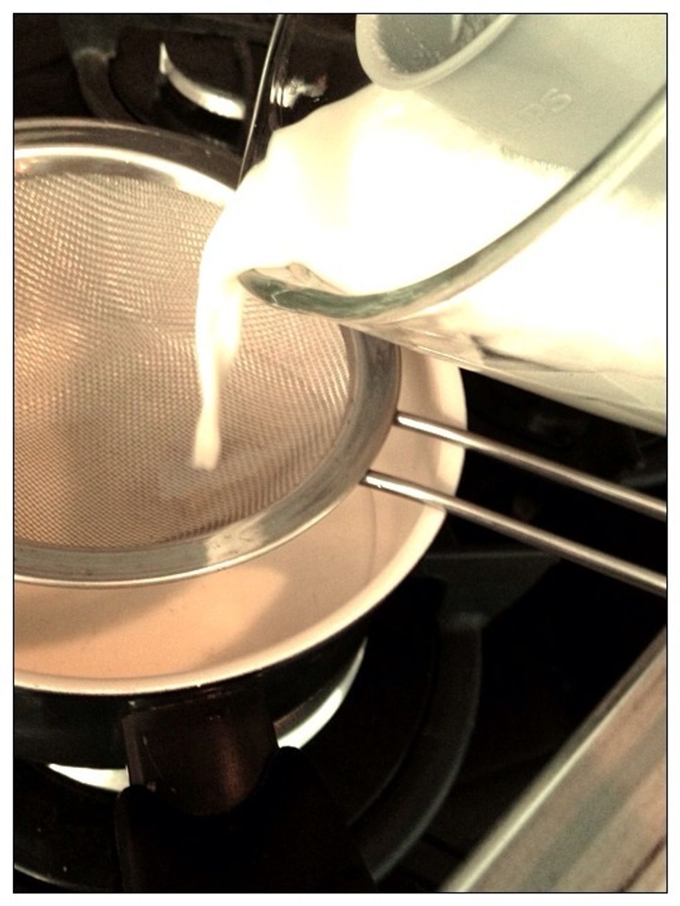 Pour and sieve the blended soya bean into a pan over a small fire and cook it for about 10-15minutes (or until it boils)
