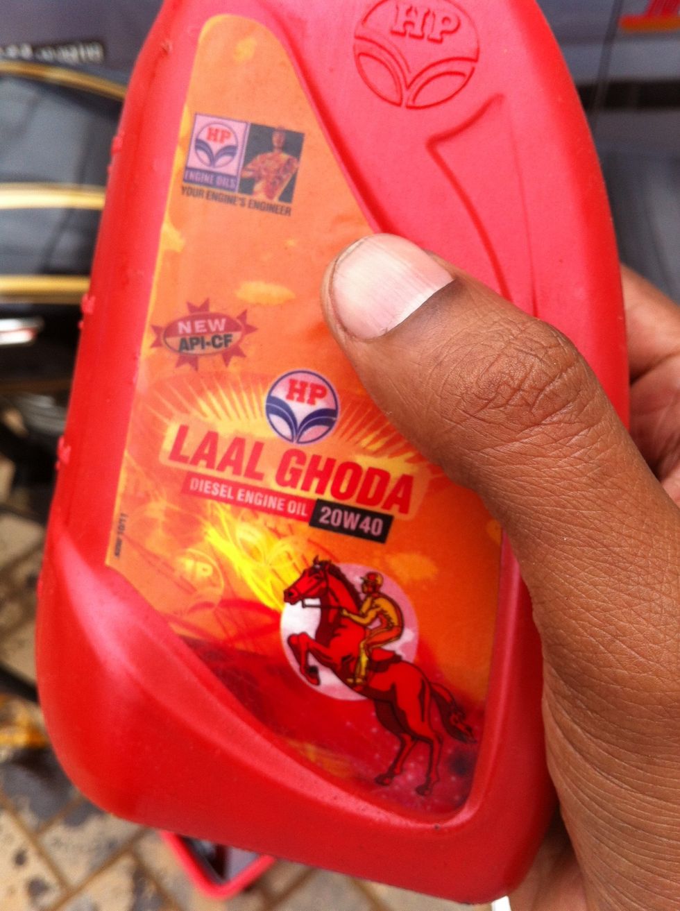 Pour any SAE 20W40 oil or use transmission fluid on non electric start motorcycles