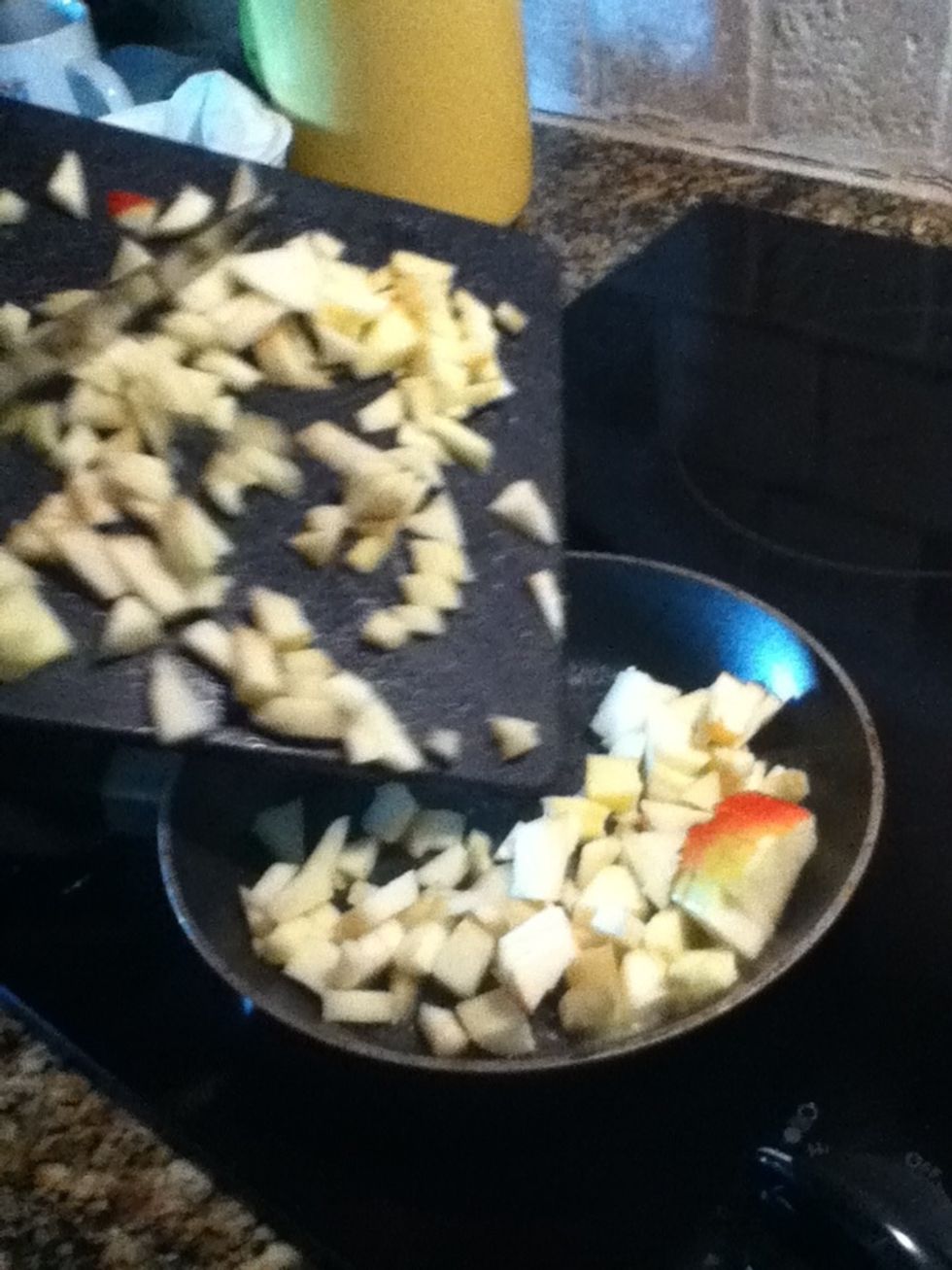 Pour apples into skillet and cook for 5-7 minutes, stirring occasionally.