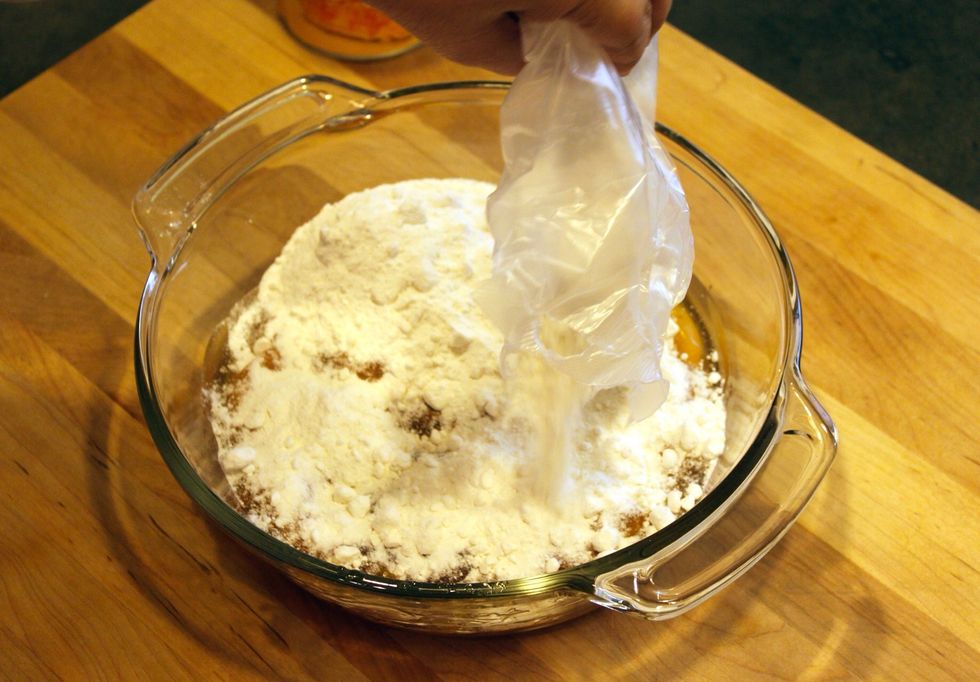 Pour approximately half of the cake mix on top (you don't have to measure, just eyeball it).
