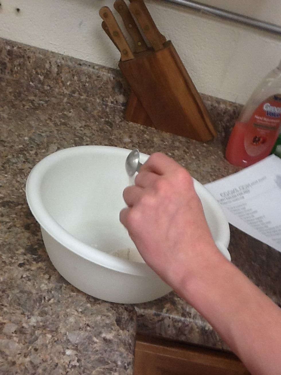 Pour baking powder into bowl.